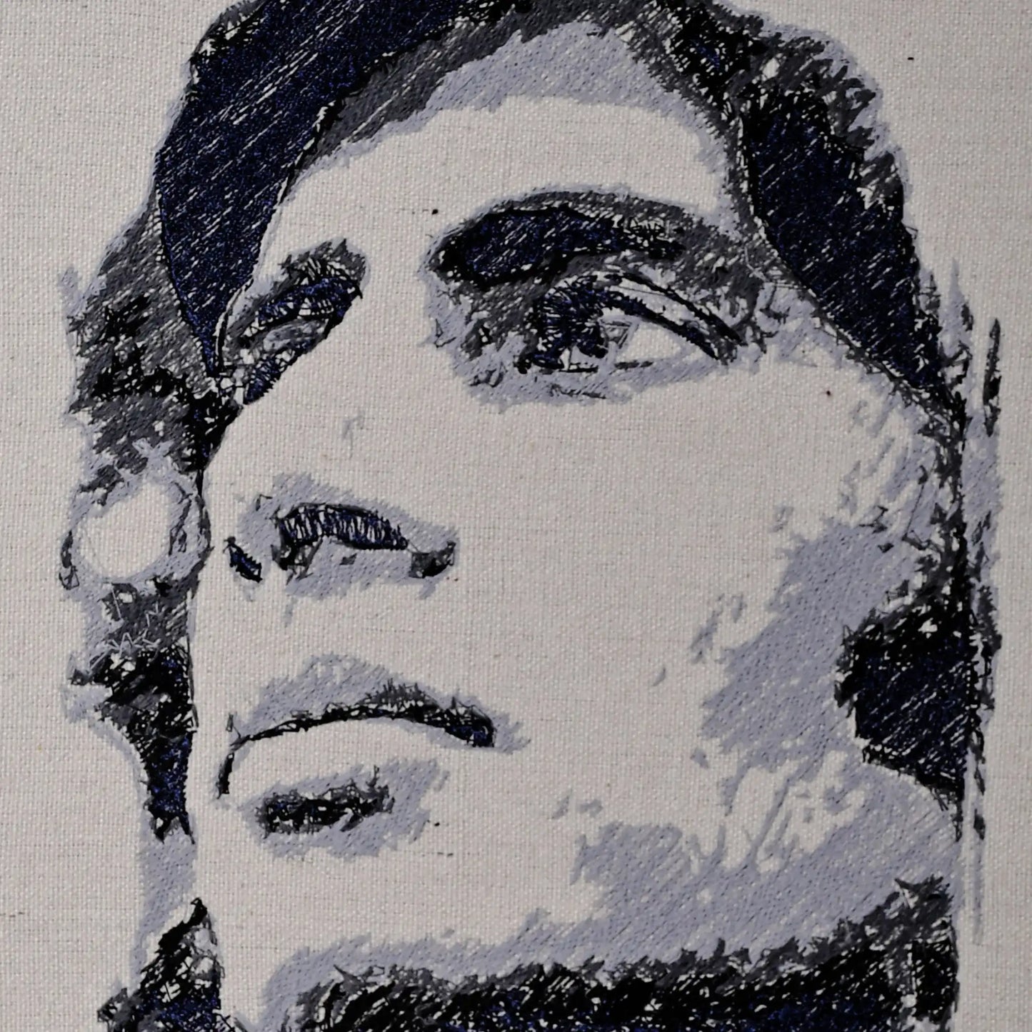 Close up of Amitabh Bachchan thread embroidery portrait detail — Bollywood wall art by Embroidist