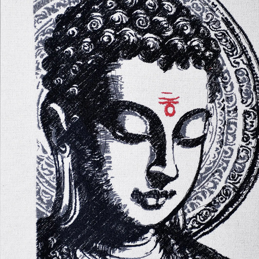 Close up of Buddha thread embroidery detail — spiritual wall art by Embroidist