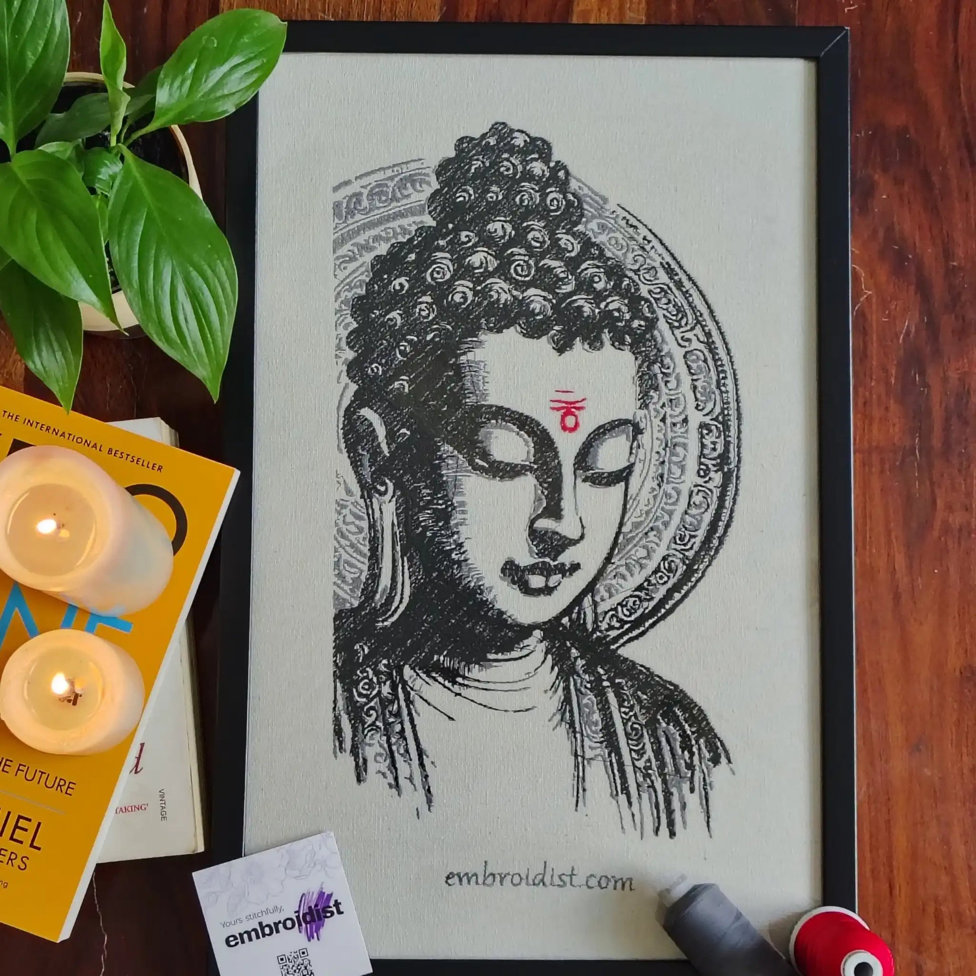 Buddha The Awakened One embroidered wall art lifestyle image — framed art in home setting by Embroidist
