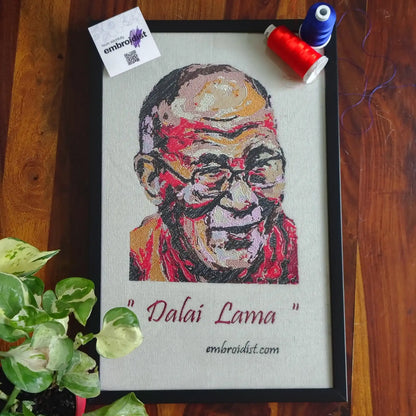 Dalai Lama embroidered wall art lifestyle image — framed art in home setting by Embroidist