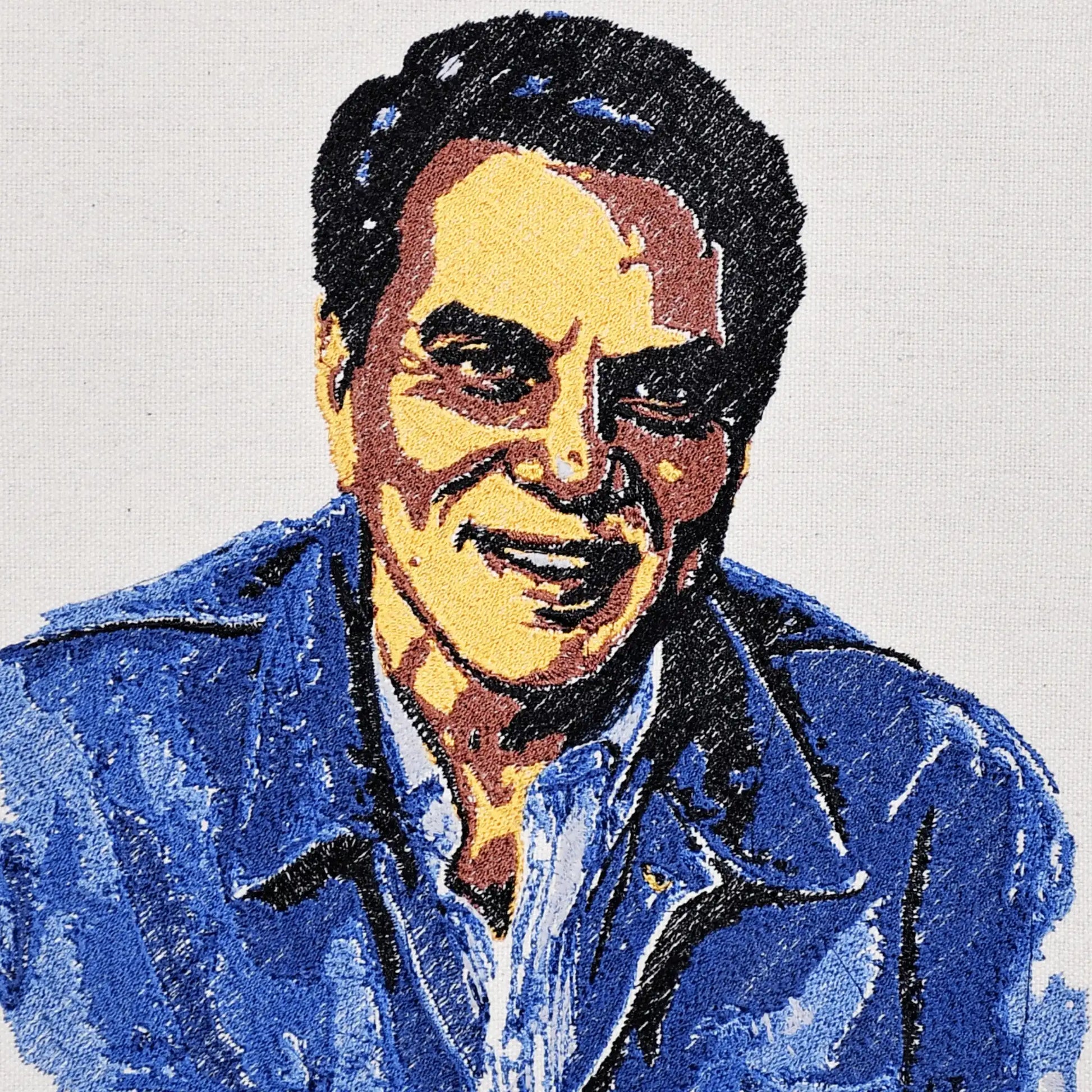 Close up of Dharmendra thread embroidery portrait detail — Bollywood wall art by Embroidist