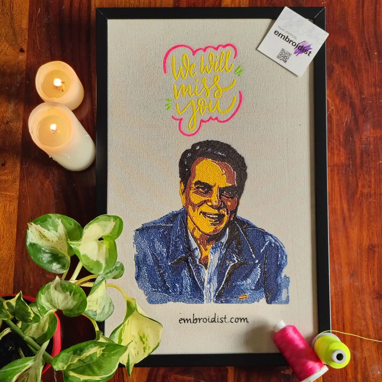 Dharmendra embroidered wall art lifestyle image — framed art in home setting by Embroidist