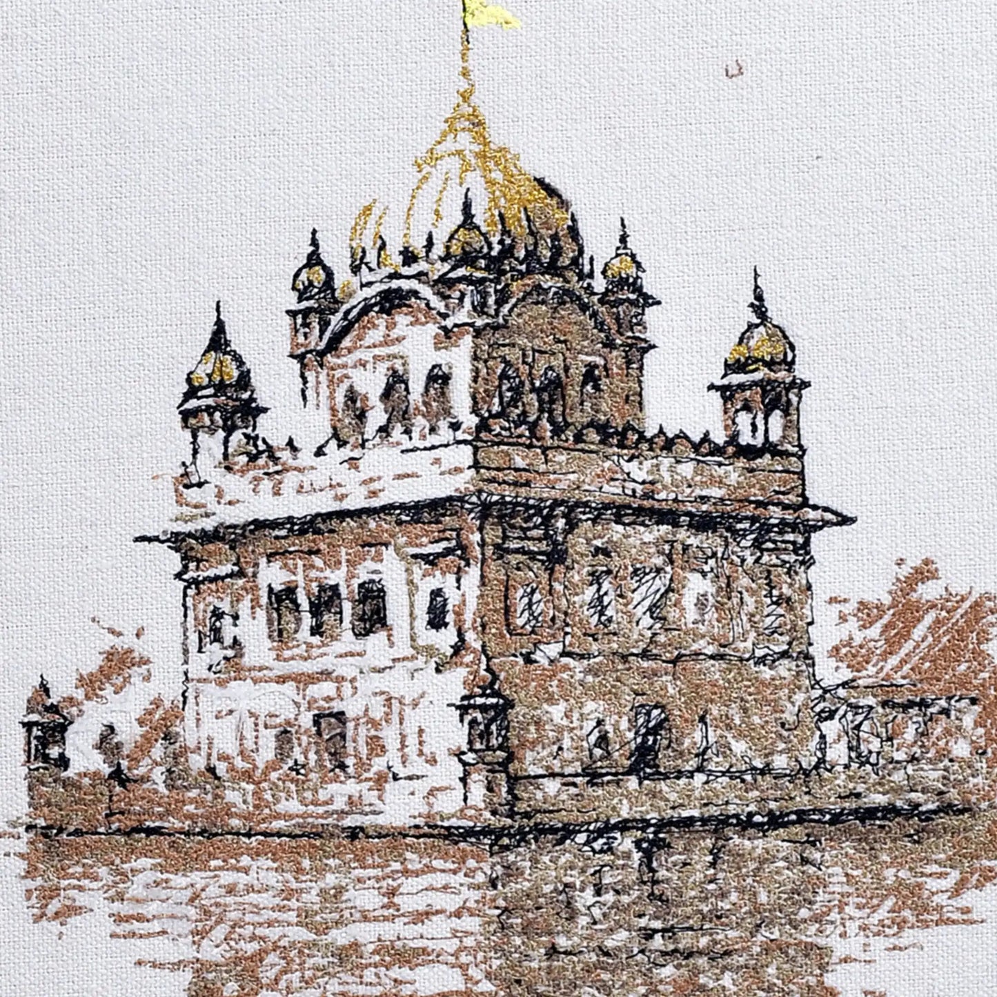 Close up of Golden Temple thread embroidery detail — Sikh spiritual wall art by Embroidist