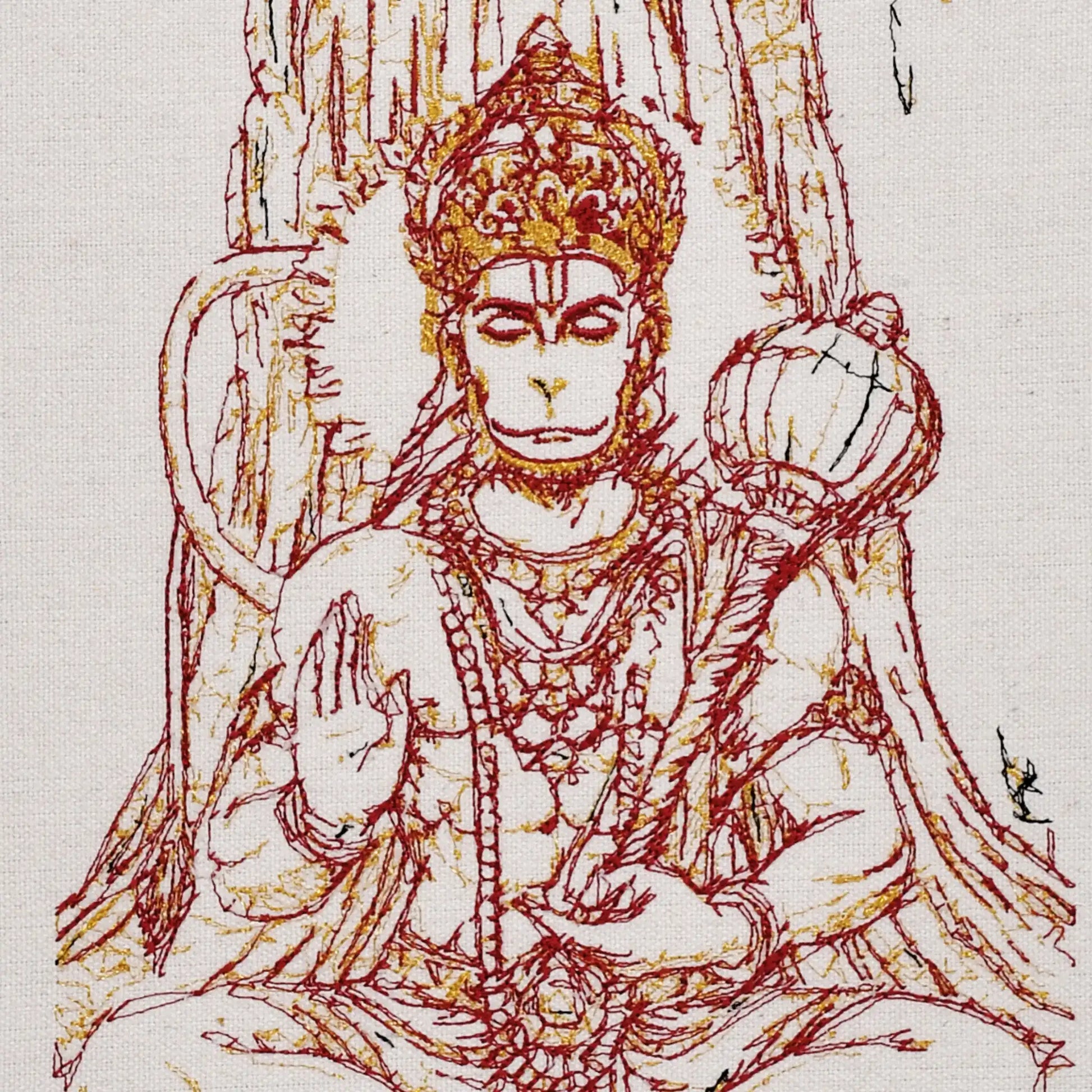 Close up of Hanumanji thread embroidery detail — spiritual wall art by Embroidist