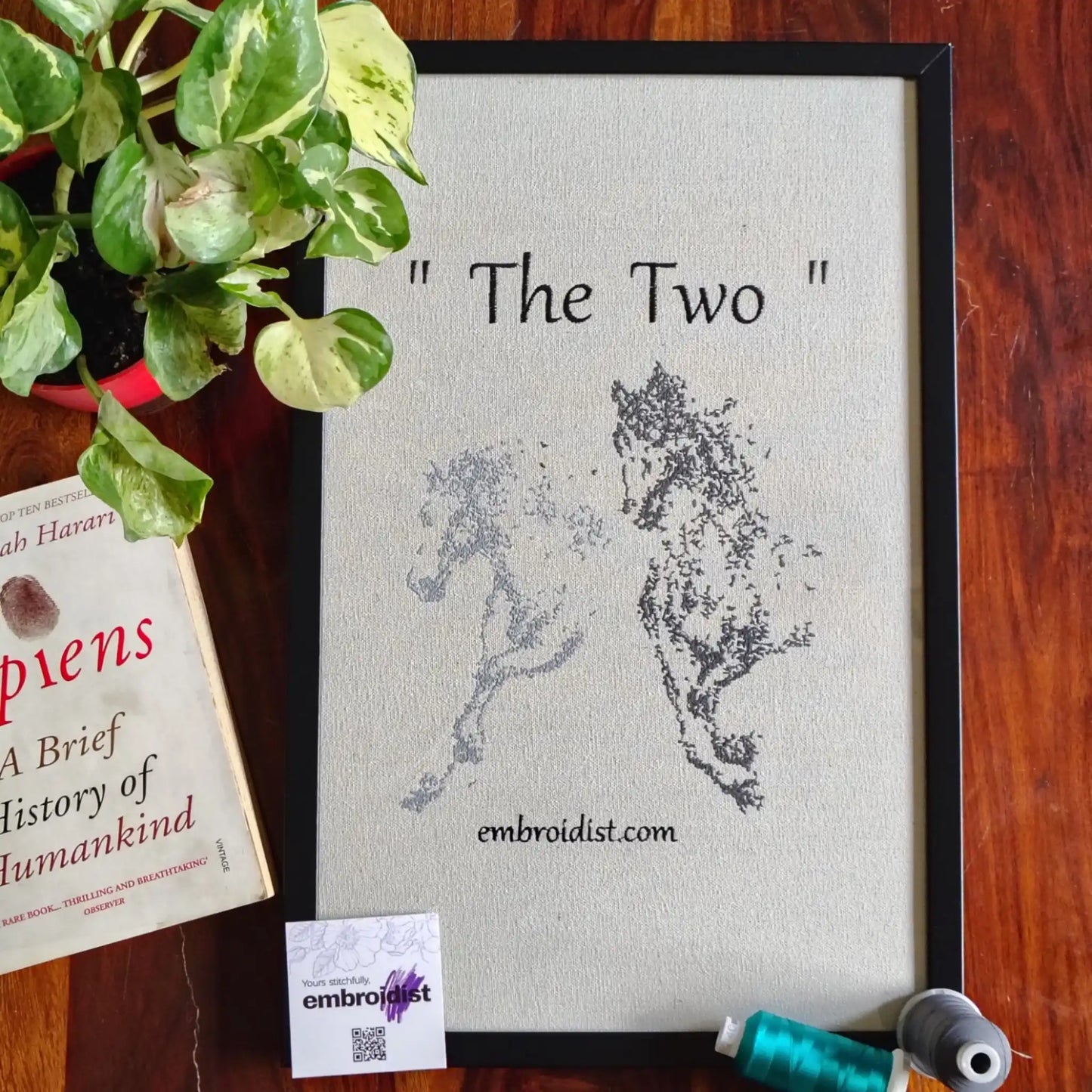 The Two horse embroidered wall art lifestyle image — framed art in home setting by Embroidist