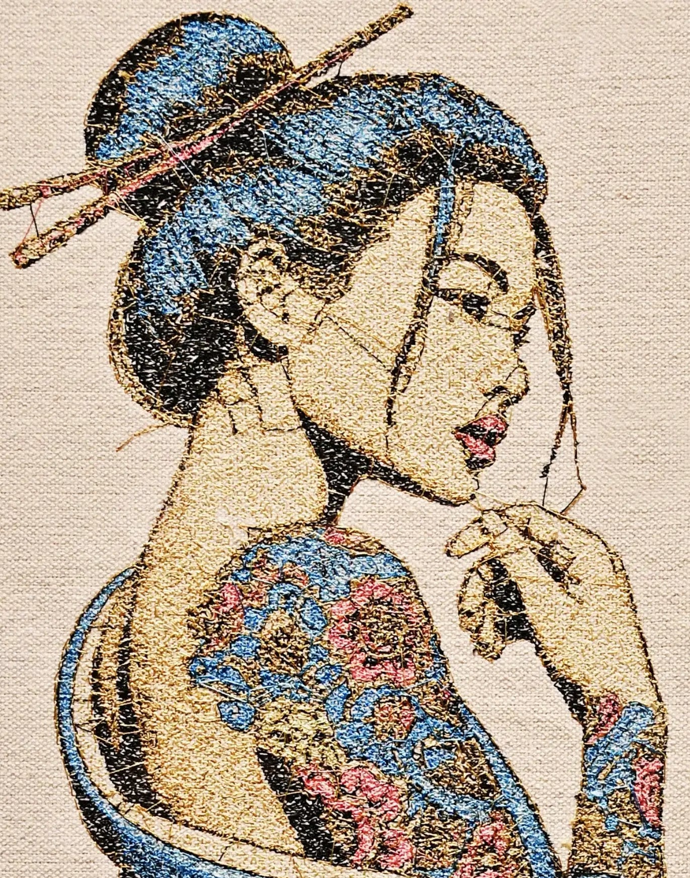Close up of Japanese Geisha thread embroidery detail — wall art by Embroidist