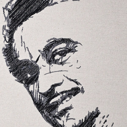 Close up of Kishore Kumar thread embroidery portrait detail — Bollywood wall art by Embroidist