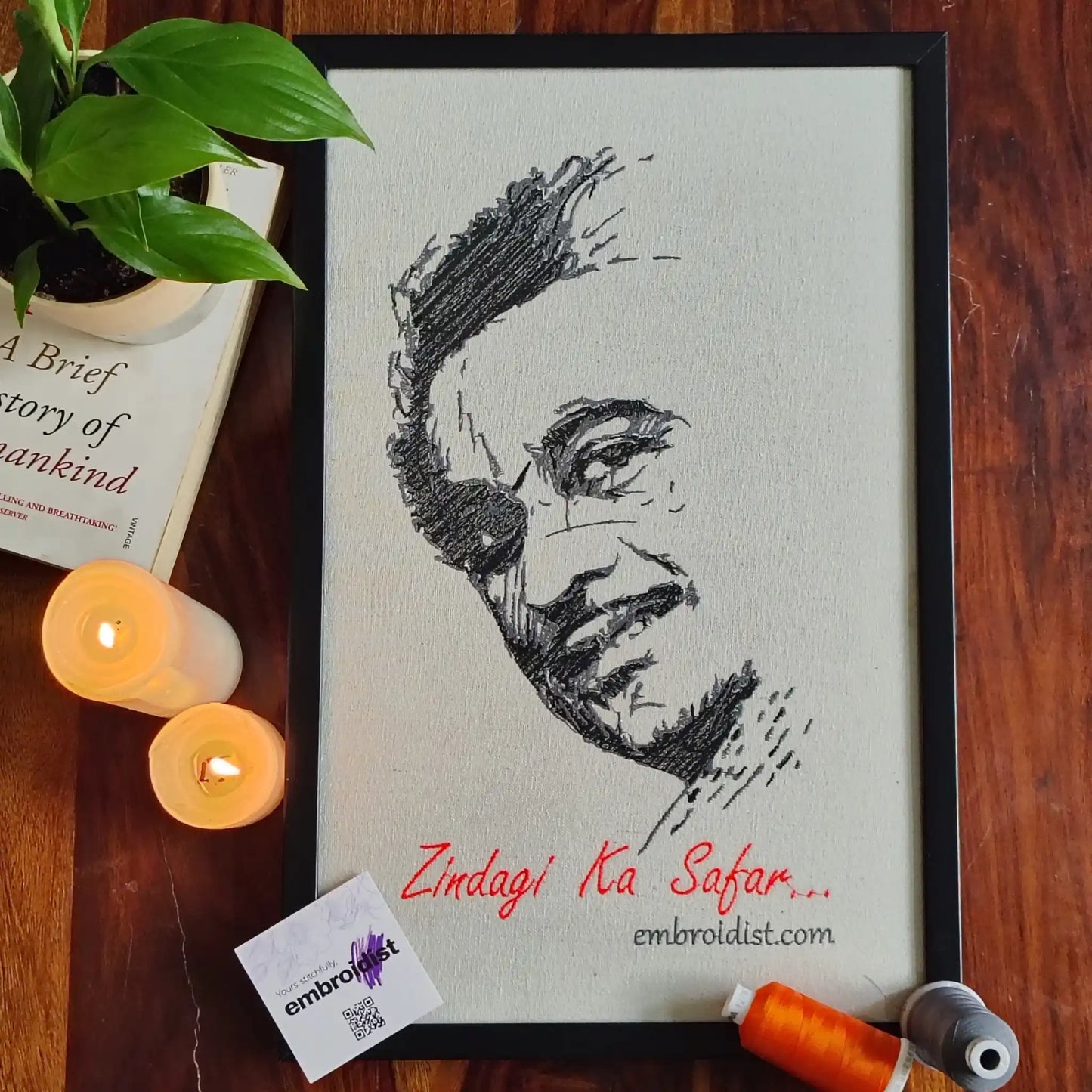 Kishore Kumar embroidered wall art lifestyle image — framed art in home setting by Embroidist