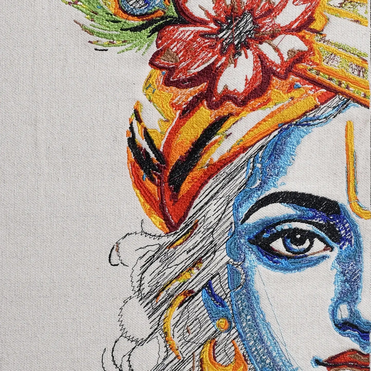 Close up of Lord Krishna half face thread embroidery detail — spiritual wall art by Embroidist