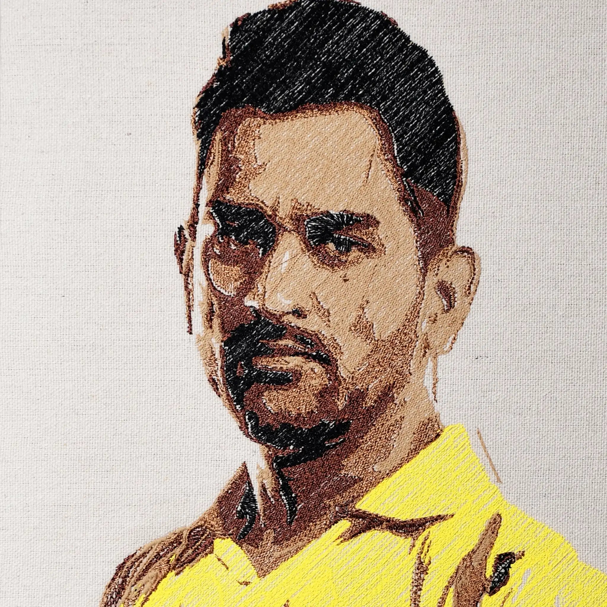 Close up of MS Dhoni thread embroidery portrait detail — cricket wall art by Embroidist
