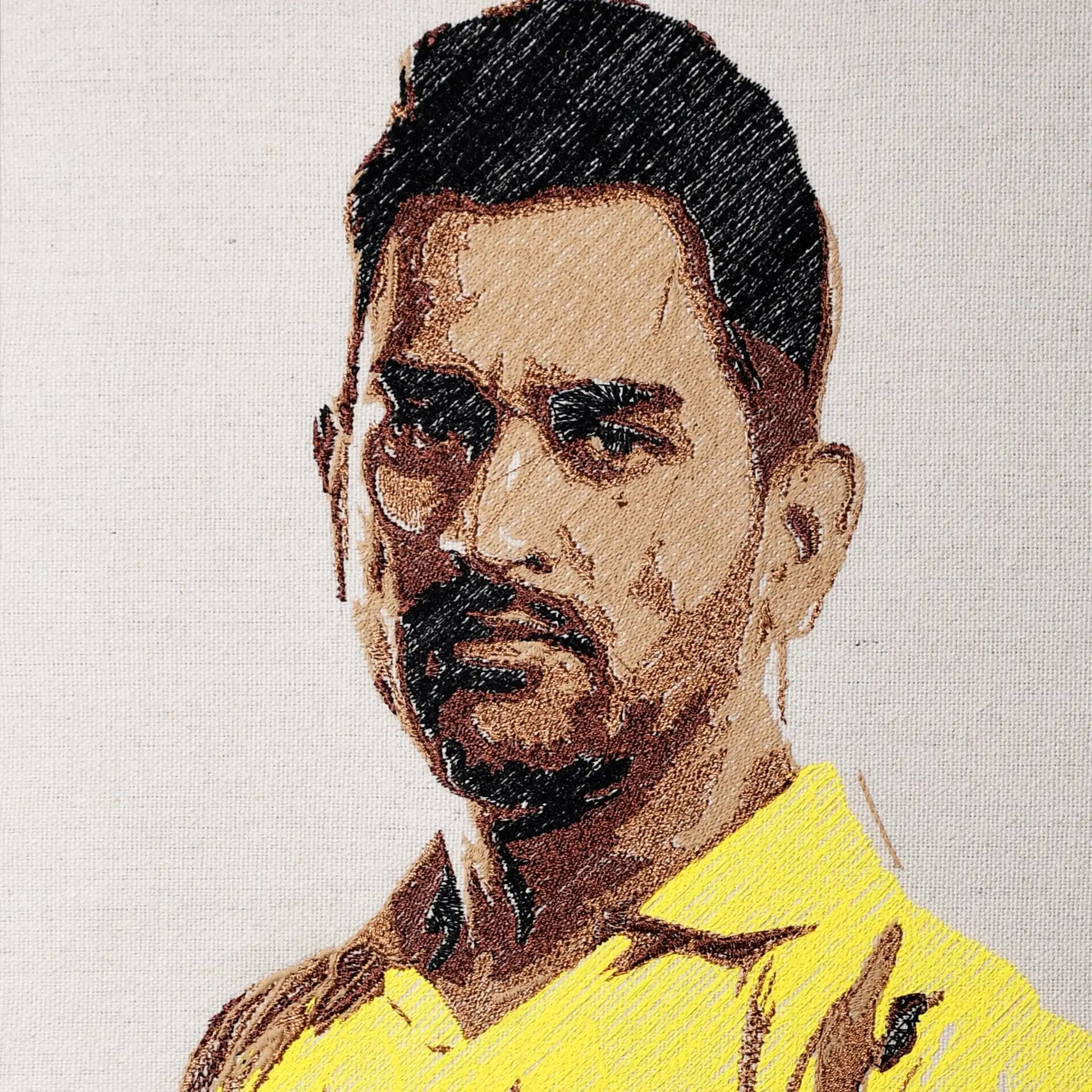 Close up of MS Dhoni thread embroidery portrait detail — cricket wall art by Embroidist