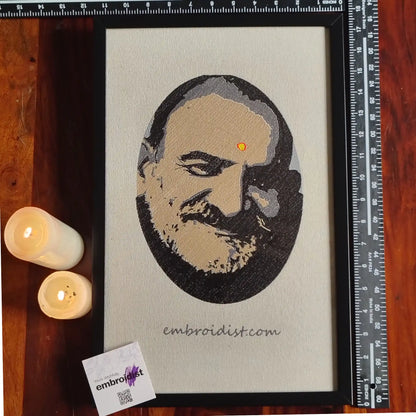 Framed Neem Karoli Baba embroidered wall art — 17.3x11.3 inch machine embroidery handcrafted in India by Embroidist