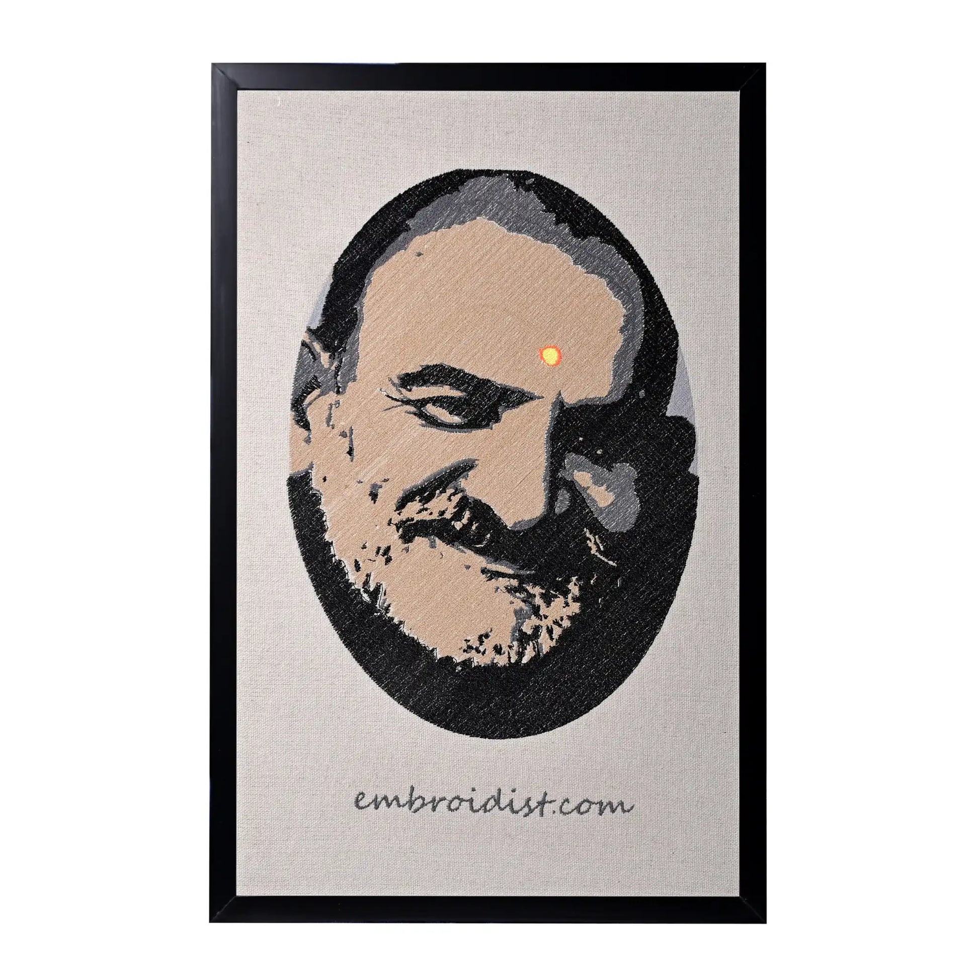 Machine embroidered Neem Karoli Baba portrait wall art — 87,558 stitches on canvas by Embroidist