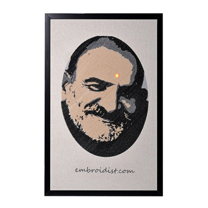 Machine embroidered Neem Karoli Baba portrait wall art — 87,558 stitches on canvas by Embroidist