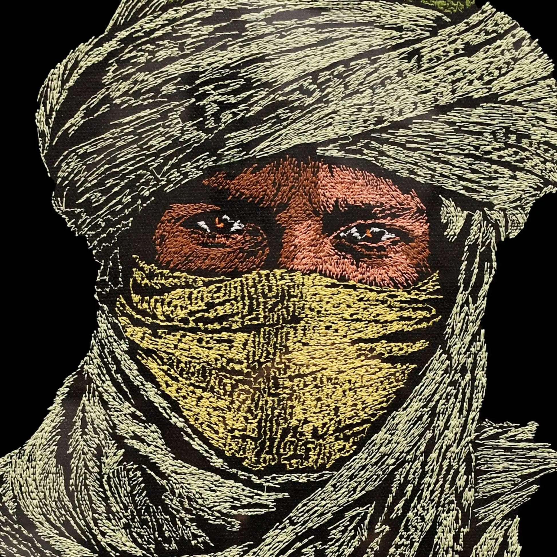 Close up of Tuareg nomad thread embroidery detail — wall art by Embroidist