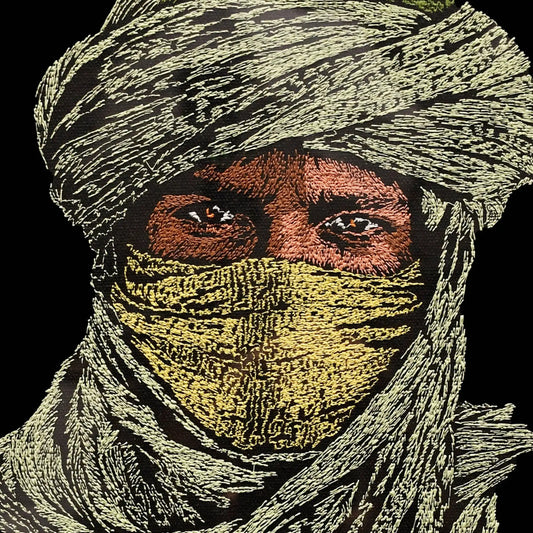 Close up of Tuareg nomad thread embroidery detail — wall art by Embroidist