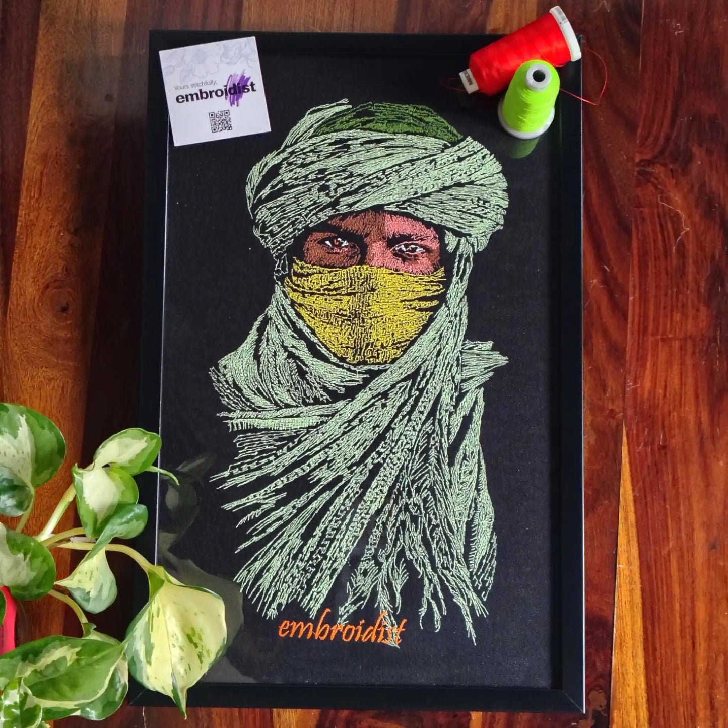 Nomad embroidered wall art lifestyle image — framed art in home setting by Embroidist