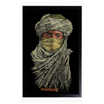 Machine embroidered Nomad wall art — 60,390 stitches on black canvas by Embroidist