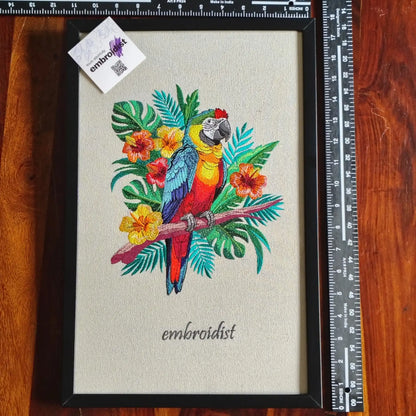 Framed macaw embroidered wall art — 17.3 x 11.3 inch machine embroidery handcrafted in India by Embroidist