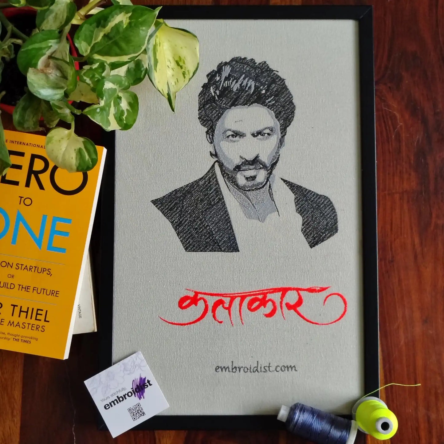 Shah Rukh Khan embroidered wall art lifestyle image — framed art in home setting by Embroidist
