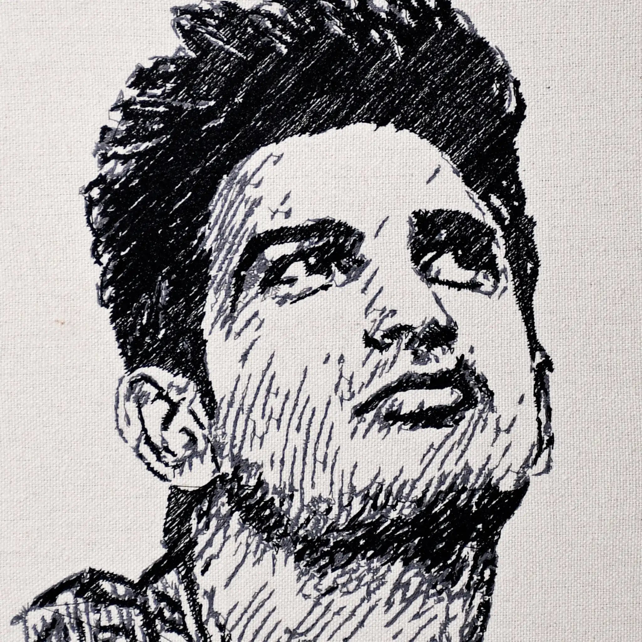 Close up of Sushant Singh Rajput thread embroidery portrait detail — wall art by Embroidist