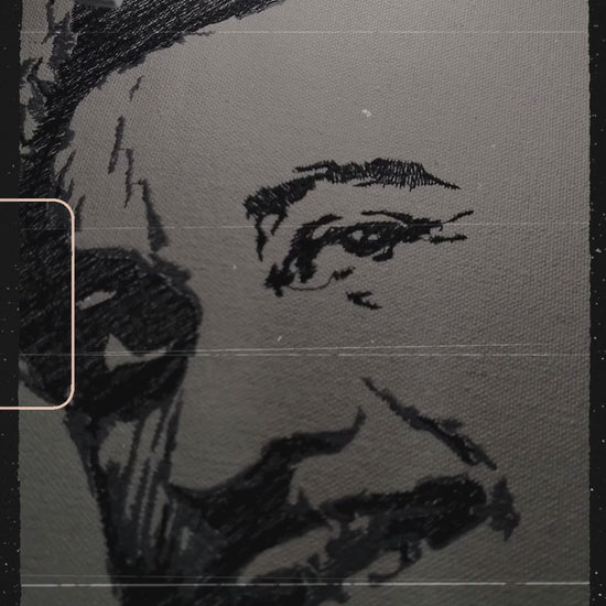 Portrait of Kishore Kumar in loose expressive black thread on natural linen, 36,241 stitches, framed embroidered wall art handcrafted in India by Embroidist