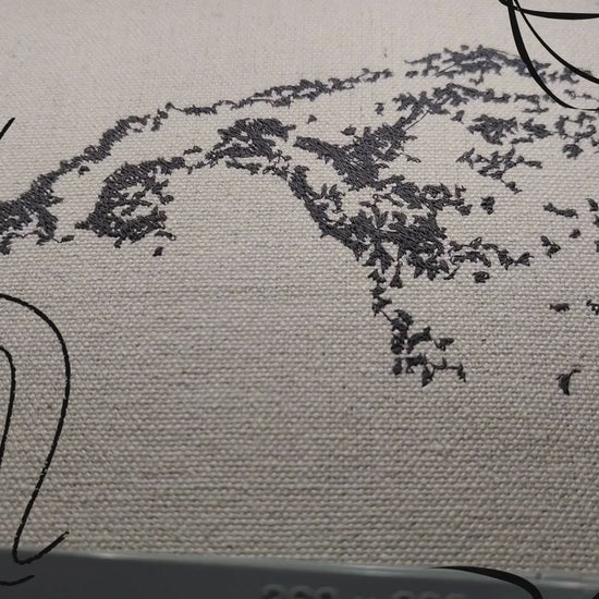 Two horses in motion with The Two typography in grey thread on natural linen, 28,328 stitches, framed embroidered wall art handcrafted in India by Embroidist