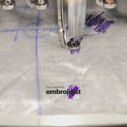 Brother embroidery machine stitching custom logo on fabric at Embroidist Meerut